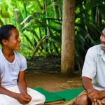 피지 여행 중 금기사항 - **Fijian Village Welcome Ceremony:** "A group of respectfully dressed tourists, comprising men and w...